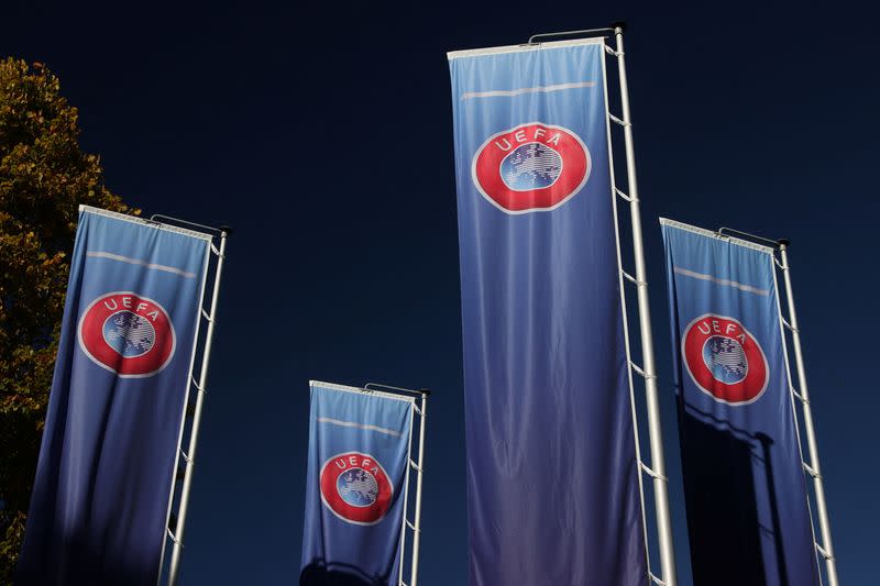 FILE PHOTO: Flags with UEFA logo are seen in Nyon