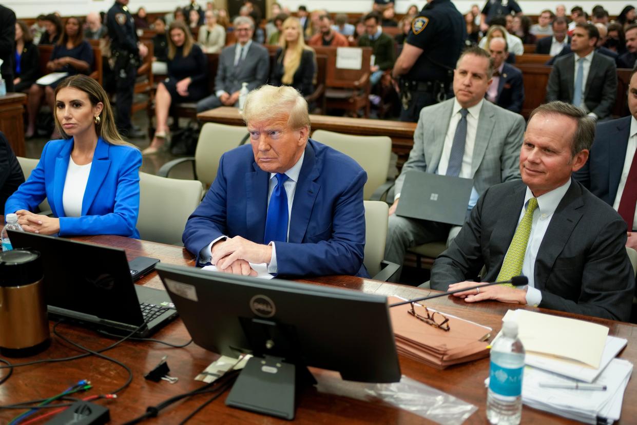 Team Trump at the defence bench for day 16 of the former president’s civil fraud trial in New York, shortly before Alina Habba (L) continues her cross-examination of Michael Cohen (AP)