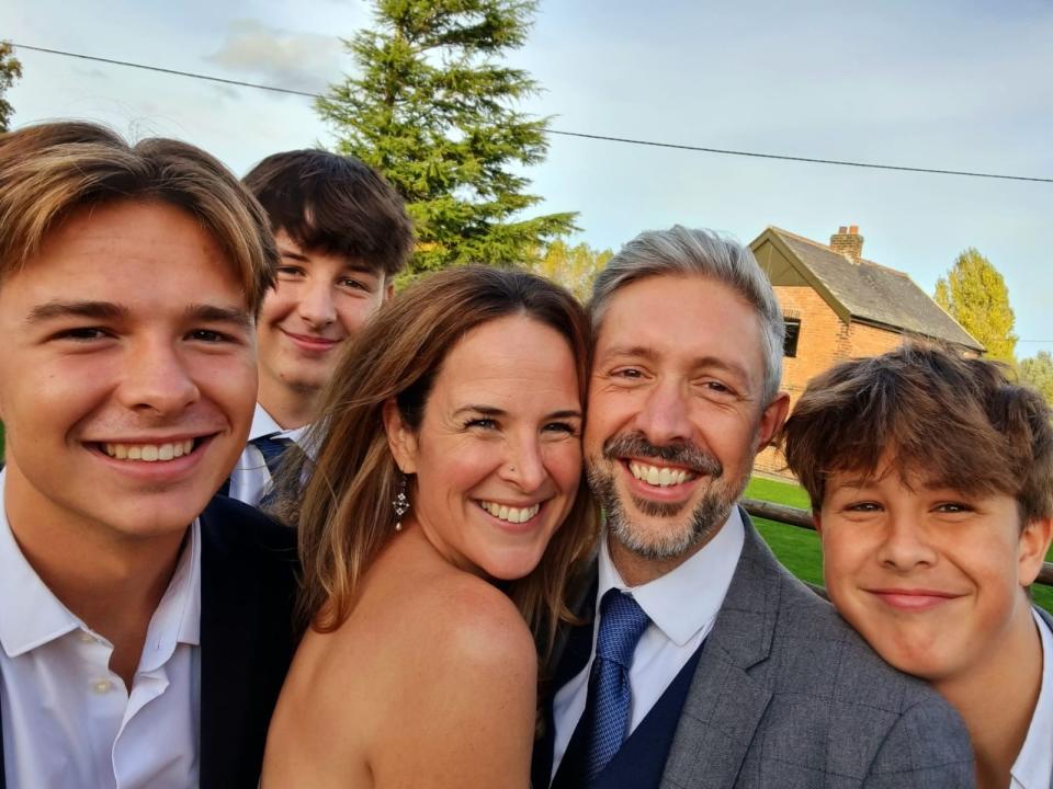 Today, Hannah and Sam - pictured with their three, teen sons - have no regrets about marrying so young. (Supplied)