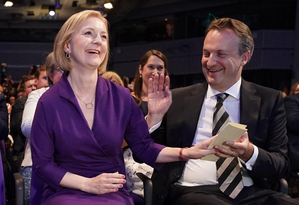 Liz Truss being congratulated by husband Hugh O'Leary (PA)