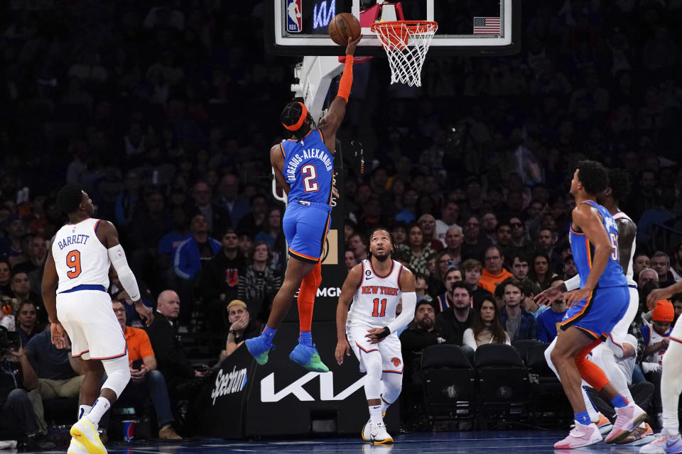 Oklahoma City Thunder guard Shai Gilgeous-Alexander (2) scores during the first half of an NBA basketball game against the New York Knicks, Sunday, Nov. 13, 2022, in New York. (AP Photo/Julia Nikhinson)