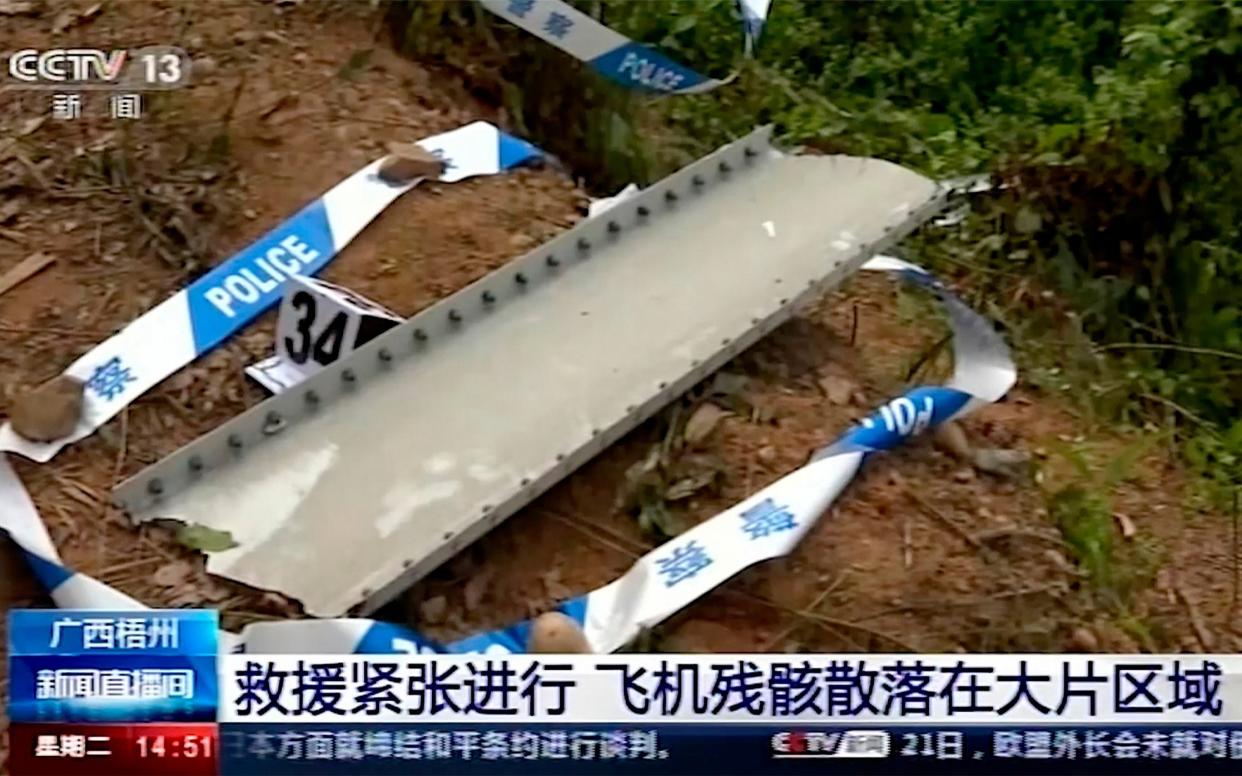 Debris surrounded by police tape aat the site of the plane crash - AP video 