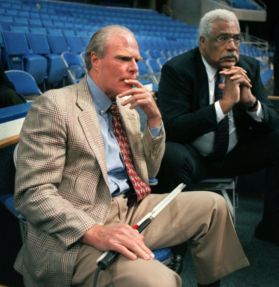 Cleveland Cavaliers owner Gordon Gund and General Manager Wayne Embry attend a Rockers practice at Gund Arena.