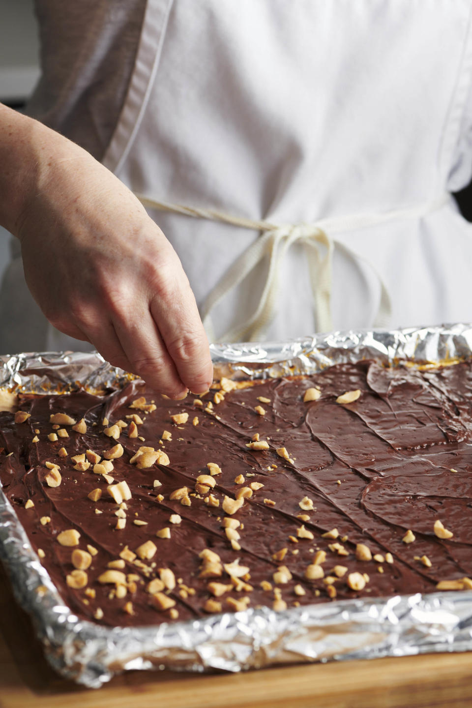 This photo shows chocolate toffee covered matzoh. Chocolate-covered caramel matzo, also known as Matzoh Buttercrunch, has become a popular Passover dessert. (Cheyenne Cohen via AP).