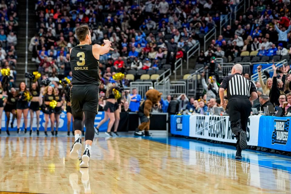 Oakland Golden Grizzlies guard Jack Gohlke (3) celebrates shooting a 3-pointer in the first round of the 2024 NCAA Tournament at PPG Paints Arena in Pittsburgh, Pennsylvania on Thursday, March 21, 2024.