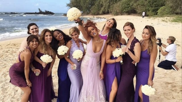 Rihanna was a bridesmaid, everybody. The 27-year-old pop star was in Hawaii on Monday for her assistant Jennifer Morales' wedding to Aaron Davis -- where she rocked a purple Badgley Mischka Couture V-neck tulle gown gown, and pretty much set the bar on being a bridesmaid. It is not without much consideration that we say this, but Rihanna might officially be the greatest bridesmaid of all time. Universal Pictures We are sorry Kristen Wiig, we know. But we have our reasons. http://amusedeasily113.tumblr.com/post/40979374253 We really do. Just look at this bridesmaids photo the singer posted. <strong>Pictured: The bridesmaids photo to end all bridesmaids photos.</strong> PHOTOS: Rihanna's Sexiest, Most Scandalous Shots http://mcavoys.tumblr.com/post/96727900485 Then there were the custom-made robes for the big day. http://ghmayra.tumblr.com/post/41230152494 She also never forgot about her 4/20 essentials. WATCH: Rihanna Gets the 'Munchies' at a Convenience Store And not to take all the spotlight, Rihanna also paid tribute to the couple on their big day. "I can't believe this day is finally upon us!!!!!" wrote Rihanna. "I'm so happy and so proud to see my big sis [Jennifer Morales] and my big bro [Aaron Davis] become one today!!!" <strong>A lot of 2015 couples will have to explain to their kids that "their song" is from 'Fifty Shades'</strong> NEWS: Rihanna Releases New Song 'Bitch Better Have My Money' (After Making Her Fans Really Mad) That being said, as far as we know, the #davis420wedding did not culminate in this perfect Wilson Phillips moment. http://mcavoys.tumblr.com/post/57745357467 <strong>♫ Some day somebody's gonna make you want to turn around and say goodbye! ♫ </strong> OK, it's a tie. Rihanna and Kristen Wiig are both the greatest bridesmaids of all time. Is anyone else feeling like we pretty much just pitched <em>Bridesmaids 2</em>? YOU'RE WELCOME HOLLYWOOD. And how fitting is it that both Kristen Wiig and Rihanna both have a Wilson Phillips collaboration! Watch how "Four Five Seconds" came to be below.