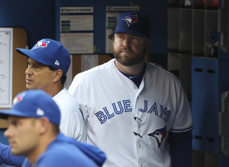 TORONTO, ON - July 2   Toronto Blue Jays major league coach John Schneider (17) is seen in the dugout.  He is Guerrero's pick to throw to him during the upcoming home run derby. The Toronto Blue Jays took on the Boston Red Sox at the Rogers Centre in American League baseball action. July 2, 2019        (Richard Lautens/Toronto Star via Getty Images)