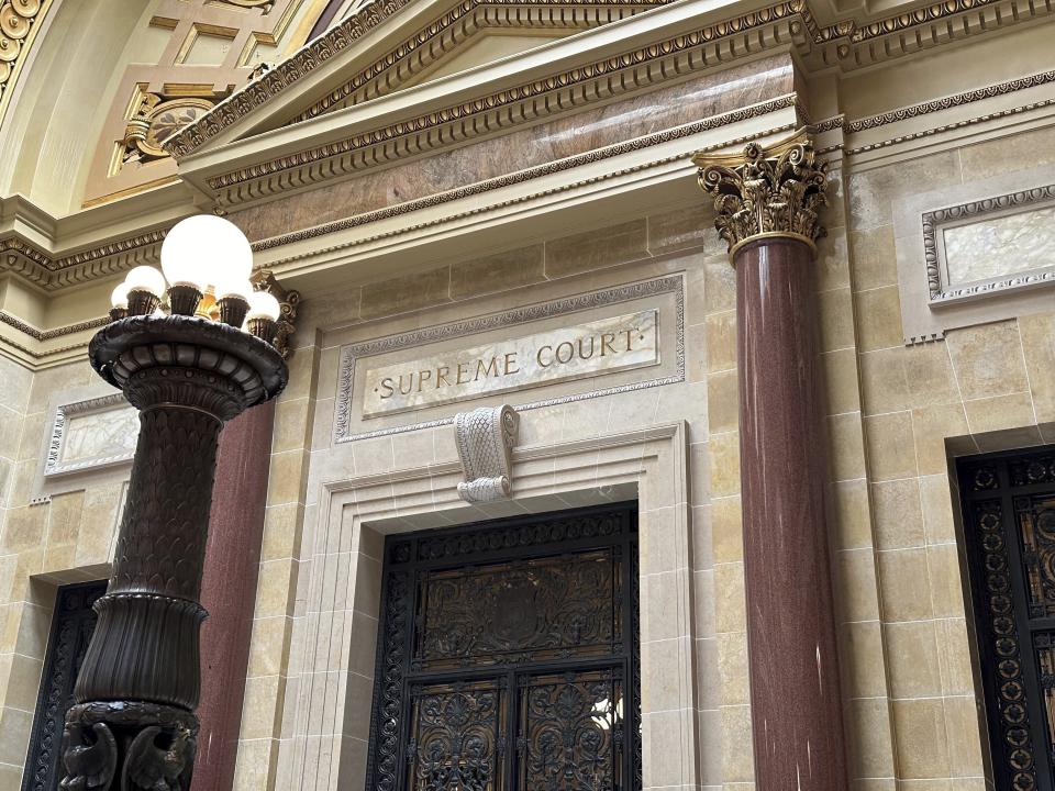 The entrance to the Wisconsin Supreme Court chambers in the state Capitol in Madison, Wis. The court on Thursday, March 14, 2024 ruled that religious exemptions to the state's unemployment tax don't apply to a Superior-based Catholic charities ministry. (Photo taken by Todd Richmond on Wednesday, March 14, 2024. (AP Photo/Todd Richmond)