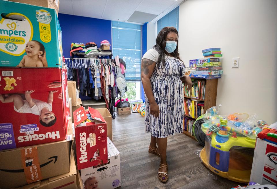 Sammie Anderson looks over the supplies on hand at Zora's Cradle. Anderson is the co-founder of Zora's Cradle and the Para Natal Resource Center director. June 8, 2022