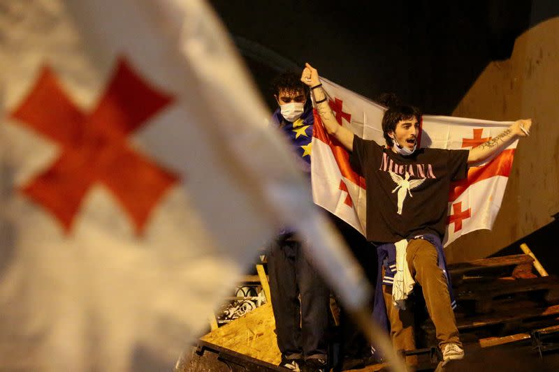 Demonstrators hold a rally to protest against a bill on "foreign agents", in Tbilisi