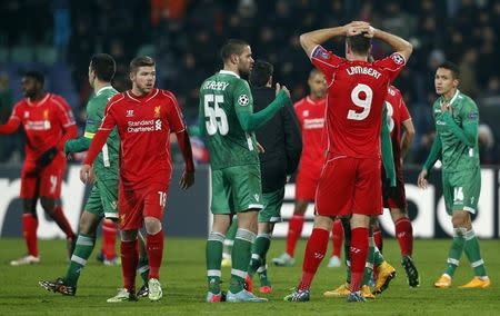Players of Ludogorets and Liverpool react at the and of their Champions League Group B soccer match at Vassil Levski stadium in Sofia, November 26, 2014. REUTERS/Stoyan Nenov