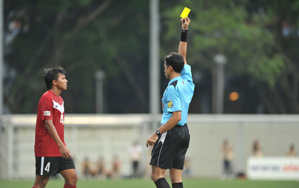 Sadik Said receives his first yellow card of the game. (Photo by Muse PR)