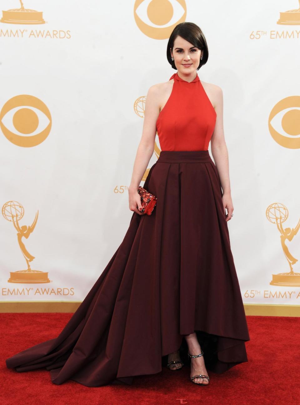 Michelle Dockery arrives at the 65th Primetime Emmy Awards at Nokia Theatre on Sunday Sept. 22, 2013, in Los Angeles. (Photo by Jordan Strauss/Invision/AP)