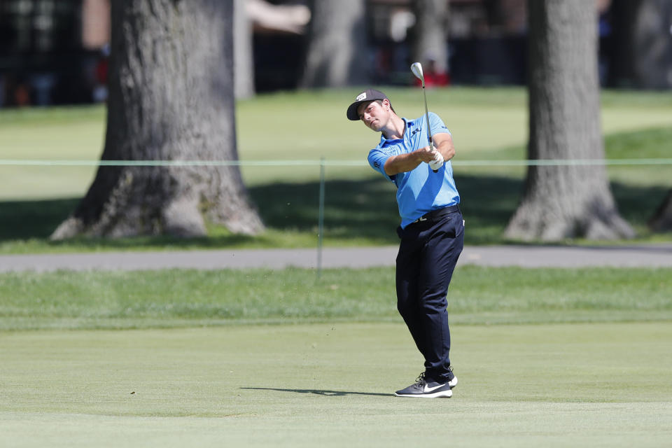 Viktor Hovland of Norway hits onto the 14th green during the third round of the Rocket Mortgage Classic golf tournament, Saturday, July 4, 2020, at the Detroit Golf Club in Detroit. (AP Photo/Carlos Osorio)