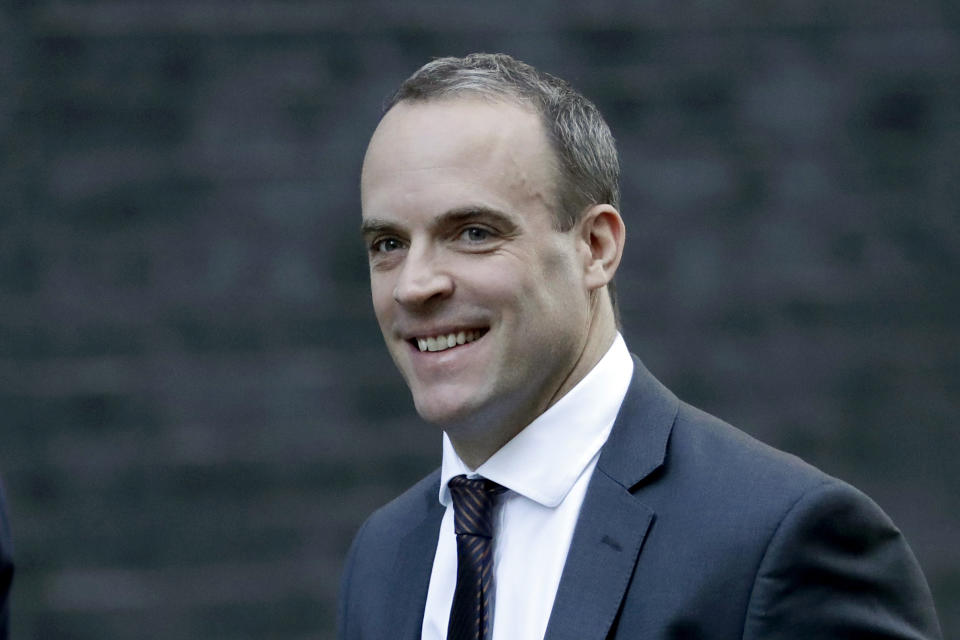 Britain's Secretary of State for Exiting the European Union Dominic Raab arrives for a cabinet meeting at 10 Downing Street in London, Tuesday, Nov. 13, 2018. (AP Photo/Matt Dunham)
