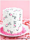 <p>We love the idea of getting out the icing pen and doodling all over an iced cake. Great fun. <i>[Photo: <a href="http://cakewhiz.com/easy-love-cake/" rel="nofollow noopener" target="_blank" data-ylk="slk:Cake Whiz;elm:context_link;itc:0;sec:content-canvas" class="link ">Cake Whiz</a>]</i></p>