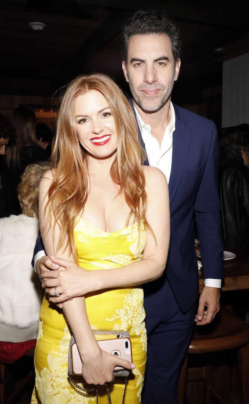 Isla Fisher and Sacha Baron Cohen attend a special screening and reception of "LION" hosted by David O'Russell and Lee Daniels celebrating director Garth Davis at Estrella on January 6, 2017 in West Hollywood, California