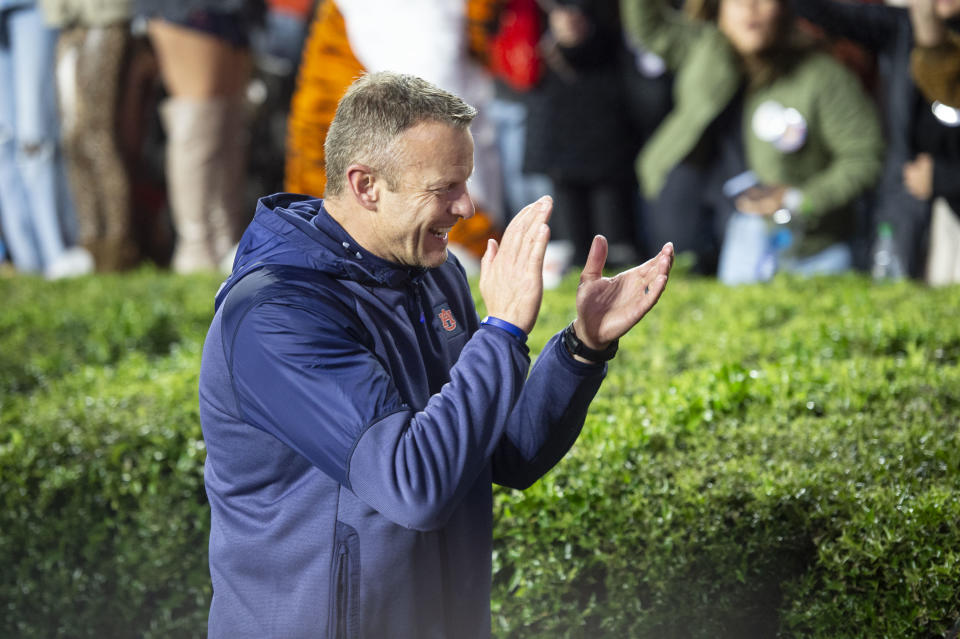 AUBURN, ALABAMA - OCTOBER 30: Head coach Bryan Harsin of the Auburn Tigers celebrates after defeating the Mississippi Rebels at Jordan-Hare Stadium on October 30, 2021 in Auburn, Alabama. (Photo by Michael Chang/Getty Images)