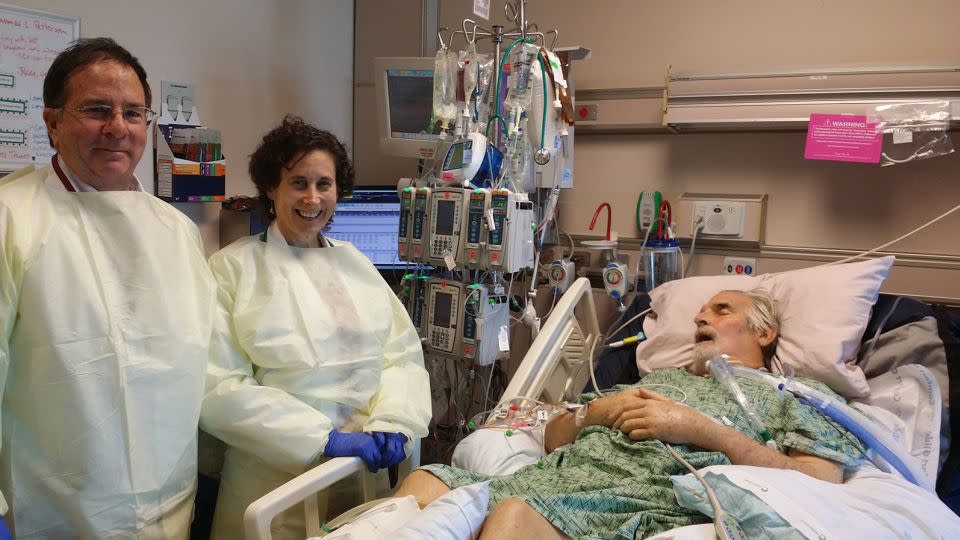 Dr. Robert "Chip" Schooley (left) and Dr. Randy Taplitz after injecting Patterson with the first round of phages at UC San Diego Medical Center. - Carly DeMento