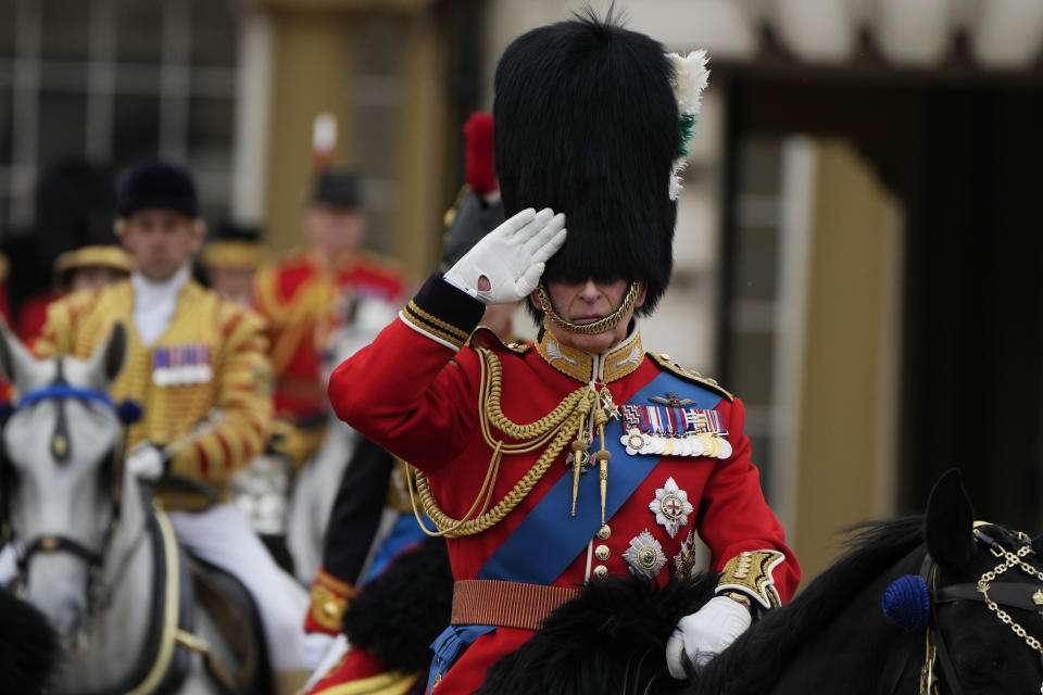 Britain's King Charles III leaves Buckingham Palace to take part in the Trooping The Colour parade, in London, Saturday, June 17, 2023. Trooping the Colour is the King's Birthday Parade and one of the nation's most impressive and iconic annual events attended by almost every member of the Royal Family.(AP Photo/Alastair Grant)