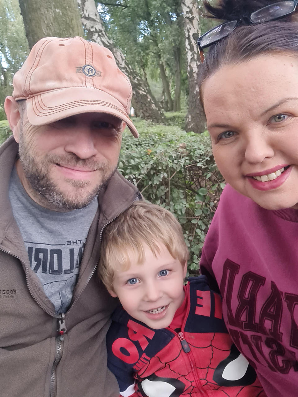 Elliott with his parents Kerry and Tim, out for the day (Collect/PA Real Life)