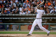 DETROIT, MI - OCTOBER 13: Alex Avila #13 of the Detroit Tigers hits a solo home run in the third inning of Game Five of the American League Championship Series against the Texas Rangers at Comerica Park on October 13, 2011 in Detroit, Michigan. (Photo by Harry How/Getty Images)