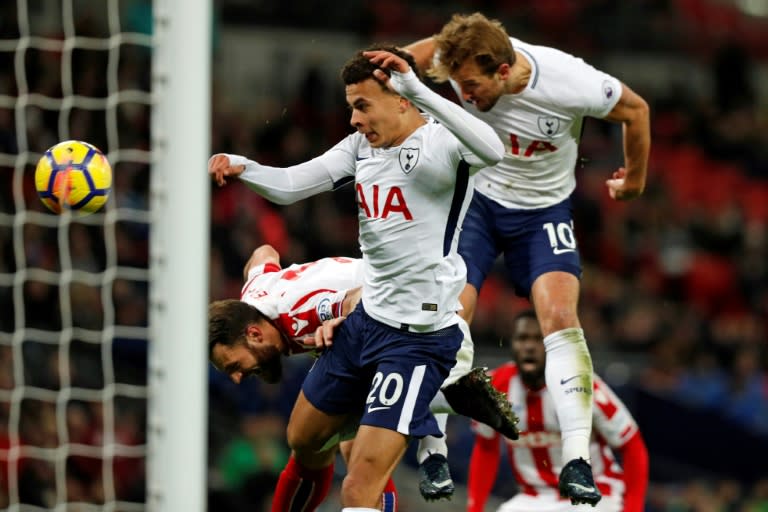 Tottenham Hotspur's Harry Kane (R) heads home their third goal against Stoke City in a 5-1 win he hopes shows the side are back to their best
