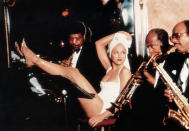 <a href="http://movies.yahoo.com/movie/madonna-truth-or-dare/" data-ylk="slk:TRUTH OR DARE;elm:context_link;itc:0;sec:content-canvas" class="link ">TRUTH OR DARE</a> (1991) <br> Directed by: Alek Keshishian<br><br>Released in the spring of 1991 -- following the successes of Madonna's fourth studio album ("Like a Prayer"), comic book blockbuster "Dick Tracy", and the Blond Ambition World Tour -- "Madonna: Truth or Dare" solidified the Material Girl's status as history's greatest self-promoter. Perceived by many as the ultimate advertisement, the black-and-white, Alek Keshishian-directed doc is beloved by fans for its behind-the-scenes peek into Madonna's heavily guarded private life and maligned by others for its overly produced scenes. Either way, it captivated audiences upon arrival, kept Madonna's name in lights, and easily became -- at that point -- the highest-grossing documentary of all time (a title it held for 11 years, until the release of fellow Michigan native Michael Moore's "Bowling for Columbine"), with a worldwide gross of nearly $30 million.