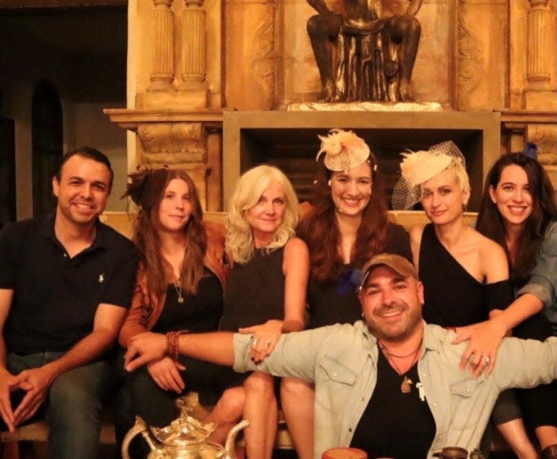 Halyna Hutchins (second from right) with Armando Gutierrez (far left) and others during filming of "Mad Hatter."