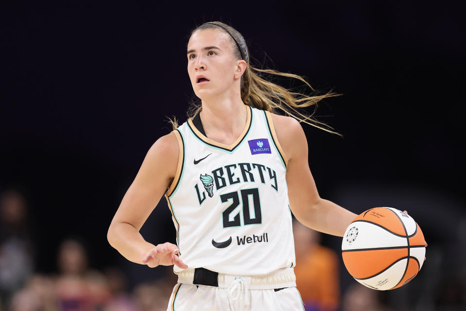 PHOENIX, ARIZONA - JUNE 18: Sabrina Ionescu #20 of the New York Liberty handles the ball during the first half of the WNBA game against the Phoenix Mercury at Footprint Center on June 18, 2024 in Phoenix, Arizona. The Mercury defeated the Liberty 99-93. NOTE TO USER: User expressly acknowledges and agrees that, by downloading and or using this Photograph, user is consenting to the terms and conditions of the Getty Images License Agreement. (Photo by Christian Petersen/Getty Images)