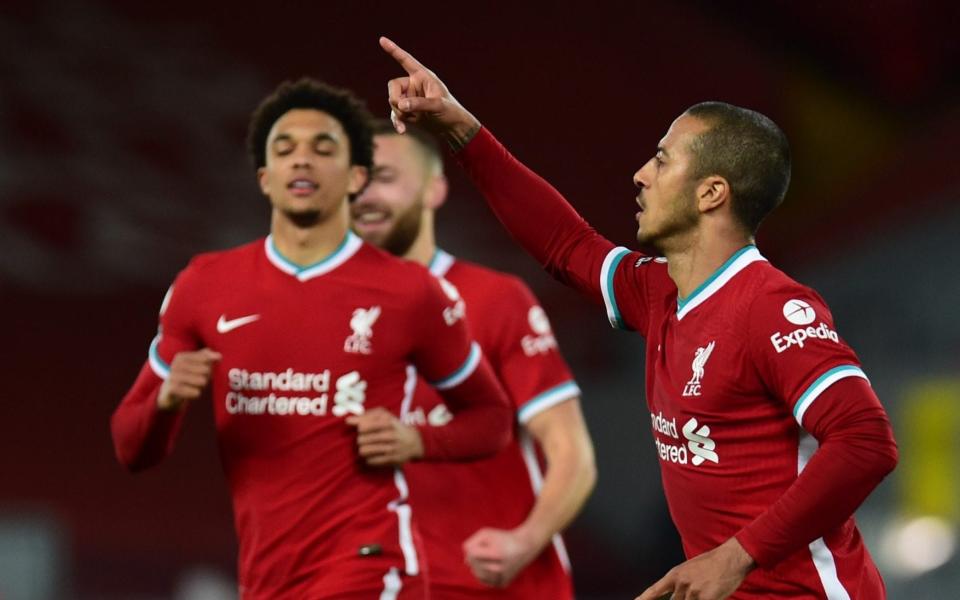 Thiago celebrates the winner at Anfield, his first goal for Liverpool   - GETTY IMAGES