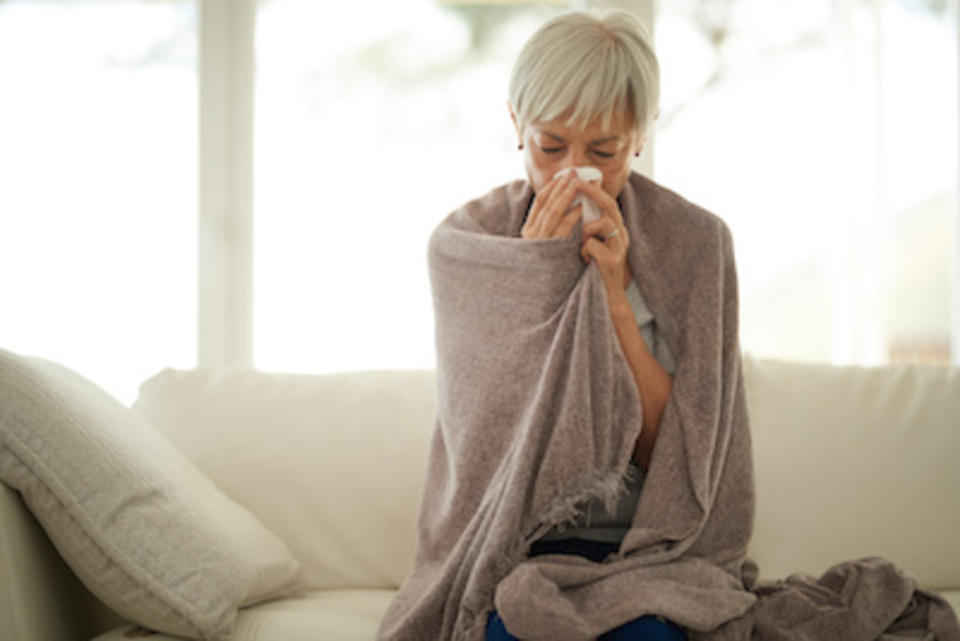 Woman blowing her nose.<p>iStock</p>