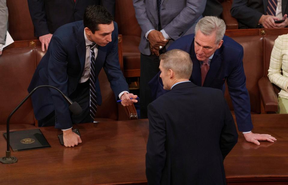 Rep. Kevin McCarthy (R-Calif.) talks with Congressman Jim Jordan (R-OH), front, after McCarthy failed to secure the necessary Republican votes to become House speaker, marking the first time a majority party’s nominee has faltered on an initial ballot in a century on the first day of the 118th session of Congress begins on Jan. 3, 2023.