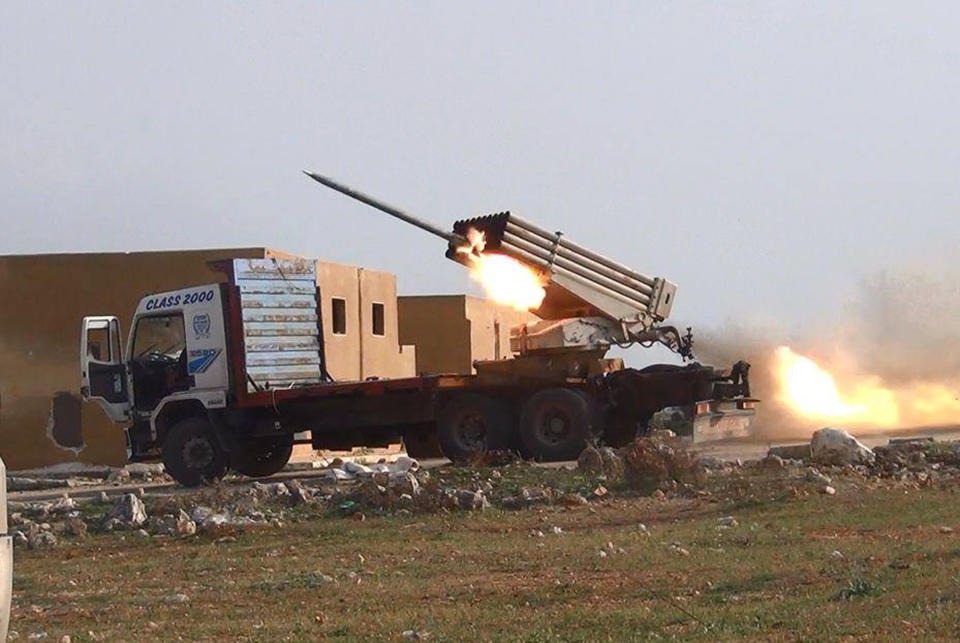 This photo provided by the anti-government activist group Aleppo Media Center (AMC), which has been authenticated based on its contents and other AP reporting, shows multiple rocket launchers fire Grad missiles by the Syrian rebels as they shell the government forces positions, in Aleppo, Syria, Monday April 14, 2014. Syrian government troops seized two villages, one of them an ancient Christian hamlet, north of Damascus on Monday, as part of the military's relentless offensive along the rugged frontier with Lebanon, state media and activists said. (AP Photo/Aleppo Media Center, AMC)