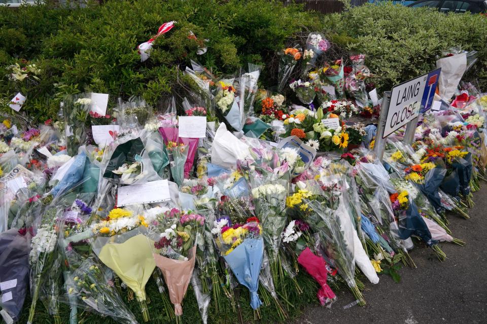 Floral tributes at the end of Laing Close near the scene in Hainault, north east London, where a 14-year-old Daniel Anjorin, was killed in a sword attack on Tuesday, that saw four others injured, including two Metropolitan Police officers Picture date: Saturday May 4, 2024.
