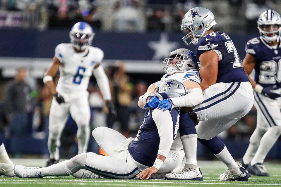 Lions defensive end Aidan Hutchinson sacks Cowboys quarterback Dak Prescott during the second half of the Lions' 20-19 loss at AT&T Stadium in Arlington, Texas on Saturday, Dec. 30, 2023.