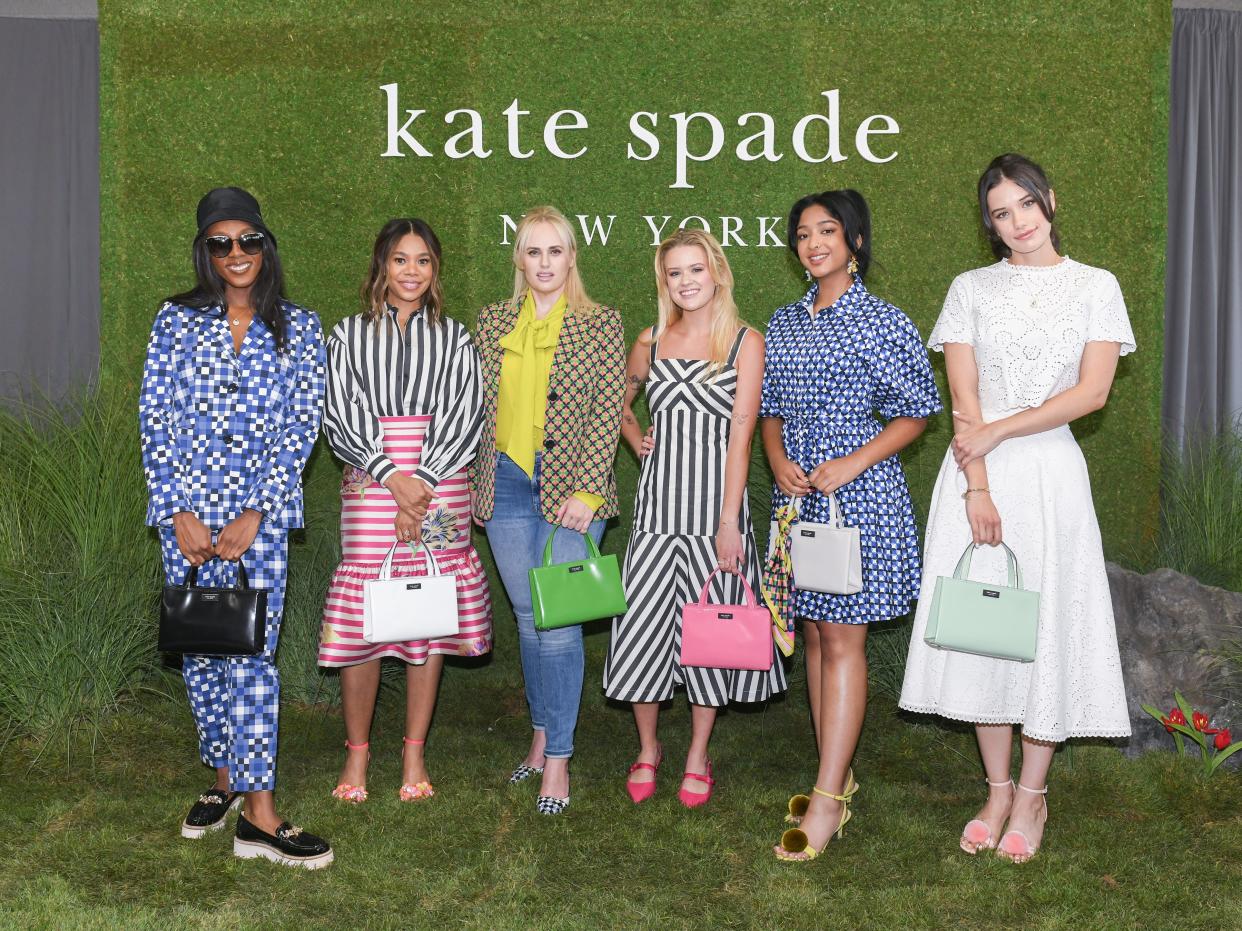 Ziwe, Regina Hall, Rebel Wilson, Ava Phillippe, Maitreyi Ramakrishnan and Ella Travolta wearing Kate Spade and carrying the reimagined Sam bag.