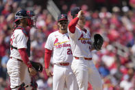 St. Louis Cardinals starting pitcher Sonny Gray, right, pauses after giving up a two-run single to Milwaukee Brewers' Owen Miller as teammates Willson Contreras, left, and Nolan Arenado watch during the seventh inning of a baseball game Sunday, April 21, 2024, in St. Louis. (AP Photo/Jeff Roberson)