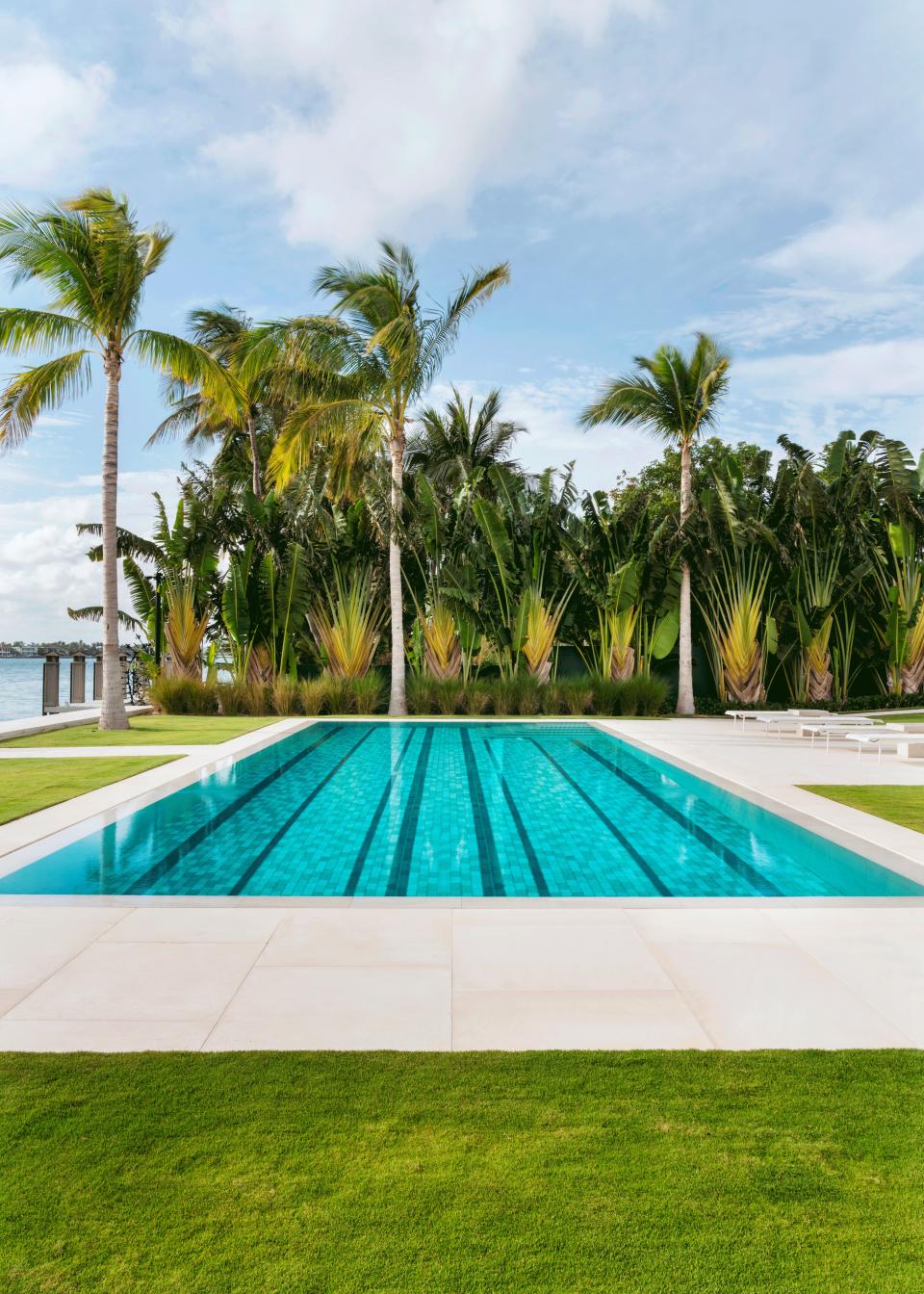 The custom pool features bay views.