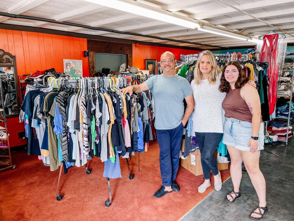 Knox Pride Center’s president John Camp, assistant director Story VanNess and summer intern Emily Beckner in the new Thriftique at 4044A Chapman Highway in South Knoxville on May 23, 2023.