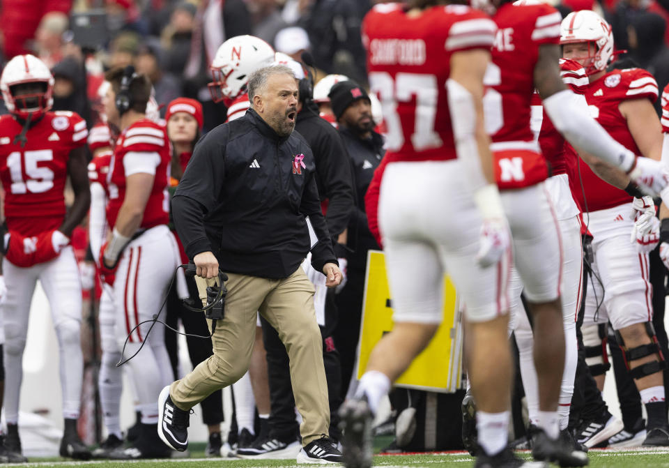 Nebraska head coach Matt Rhule, center, reacts after referees initially ruled Purdue recovered a Nebraska fumble during the first half of an NCAA college football game Saturday, Oct. 28, 2023, in Lincoln, Neb. The call was overturned upon further review. (AP Photo/Rebecca S. Gratz)
