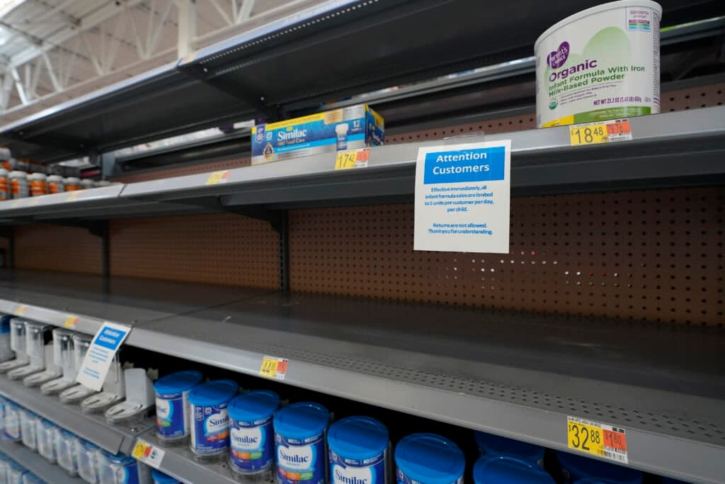 FILE – Shelves typically stocked with baby formula sit mostly empty at a store in San Antonio, Tuesday, May 10, 2022. A massive baby formula recall, combined with COVID-related supply chain problems, is getting most of the blame for the shortage that’s causing distress for many parents across the U.S. But the nation’s formula supply has long been vulnerable to this type of crisis, experts say, due to decades-old rules and policies that have allowed a handful of companies to corner nearly the entire U.S. market. (AP Photo/Eric Gay, File)