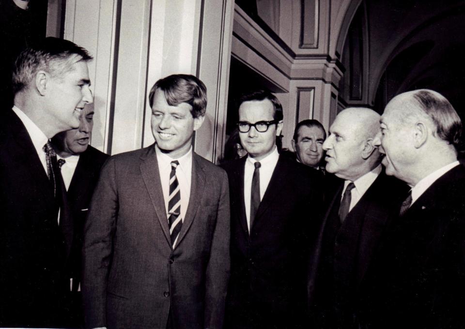 Nassau County Executive Eugene Nickerson, Senator Robert F. Kennedy, Bill Moyers, Harry F. Guggenheim, and Senator Jacob Javits atttend a luncheon at the Garden City Hotel on February 7, 1967.