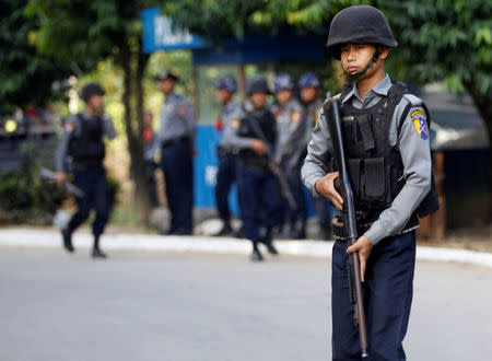 A police guards during arrival of former U.N. Secretary-General Kofi Annan as he visits in his capacity as Myanmar government-appointed Chairman of the Advisory Commission on Rakhine State, near Sittwe airport, Rakhine state, Myanmar December 2, 2016. REUTERS/Soe Zeya Tun