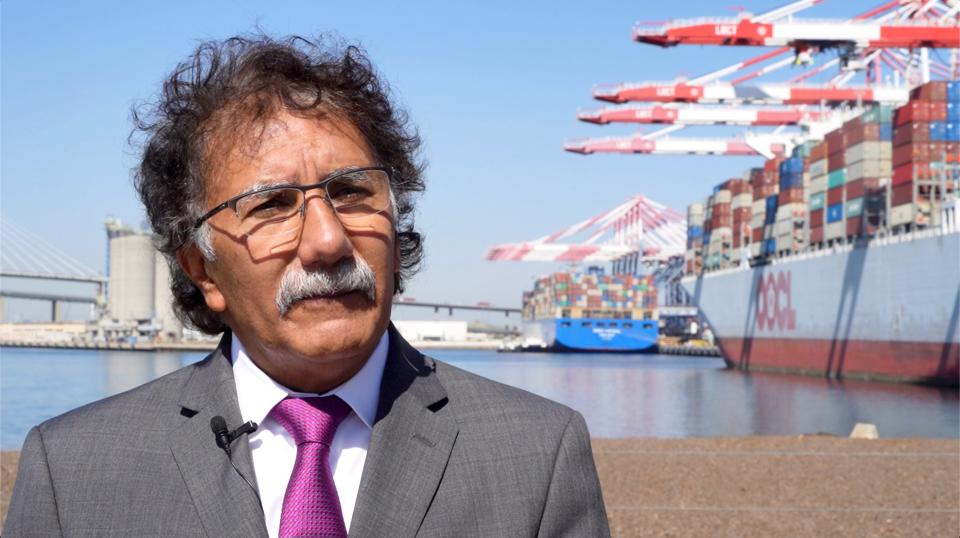 Port of Long Beach, Calif., executive director Mario Cordero, standing near a state-of-the-art terminal where cranes unload container boxes, is a strong advocate of 24/7 operations to help alleviate slowdowns in the supply chain.