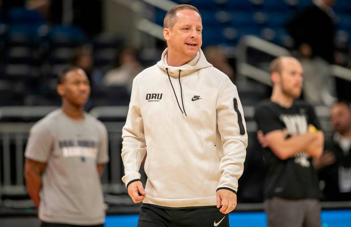Oral Roberts’ head coach Paul Mills watches his team work out during practice on Wednesday, March 15, 2023 at the Amway Center in Orlando, Fla. The Golden Eagles with face Duke in the first round of the NCAA Tournament.