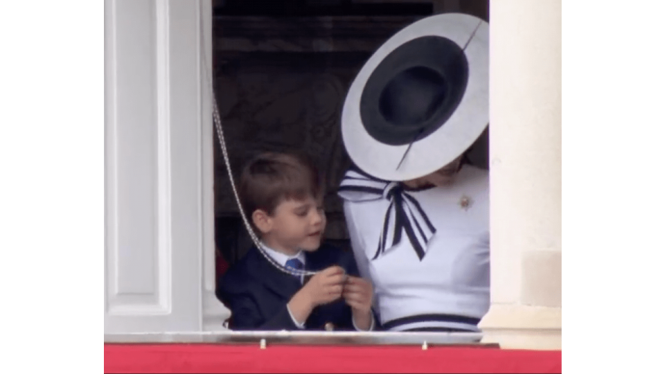 Prince Louis plays with curtain cord