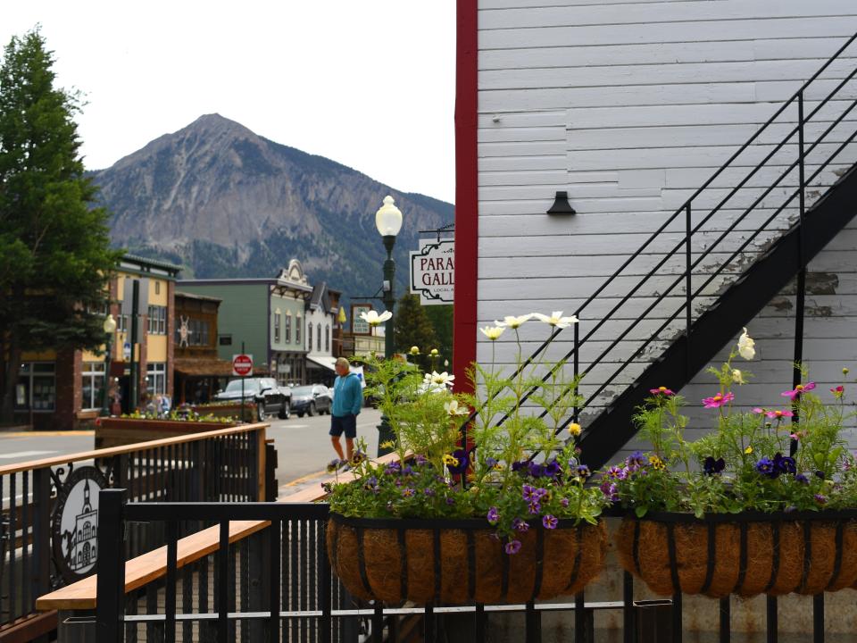 a mountain behind the small town of crested butte
