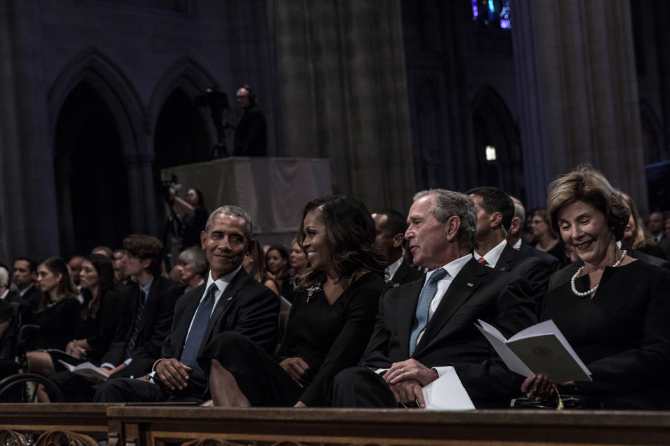 Former US President Barack Obama, Michelle Obama, former President George W. Bush and Laura Bush during a memorial service for Senator John McCain at the Washington National Cathedral on September 1, 2018.