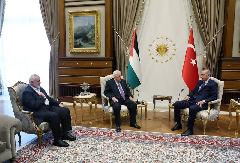 Turkey's President Tayyip Erdogan meets with Palestinian President Mahmoud Abbas and Palestinian group Hamas' top leader Ismail Haniyeh in Ankara